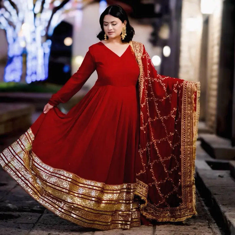 Royal Rich Maroon embroidered Anarkali complemented by exquisite gold and silver embroidery dupatta