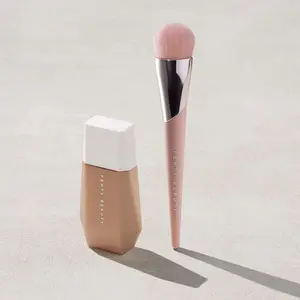 Fenty Beauty Blend + Blur Essentials: Eaze Drop Lightweight Blurring Skin Tint and Full-Bodied Foundation Brush 110 Fenty Beauty Blend + Blur Essentials: Eaze Drop Lightweight Blurring Skin Tint and Full-Bodied Foundation Brush 110