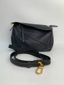 Pre-owned Loewe leather Shoulder Bags Puzzle Bag in Soft Blue with Adjustable Strap and Silver Hardware