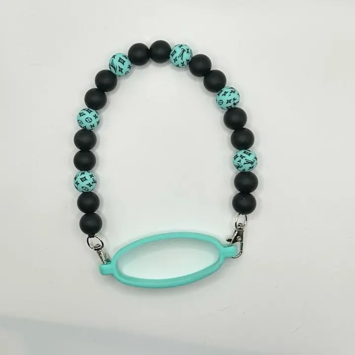 Beaded tumbler handle