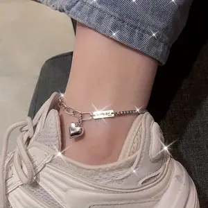 A Stylish And Versatile Heart-shaped Anklet For Women With A Korean Minimalist Style, Exuding A Sense Of Fashion And Retro Charm With Thai Silvery Lettering.