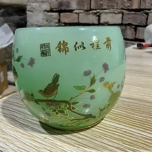 Glow-in-the-Dark Green Glaze Teacup with Peacock, Bird & Floral Designs (Gold Accents)