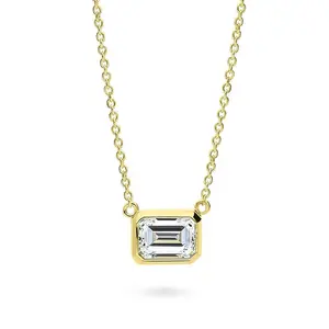 BERRICLE Yellow Gold Flashed Sterling Silver Solitaire East-West Pendant Necklace for Women, 1 Carat Bezel Set Emerald Cut Cubic Zirconia CZ 16 inch