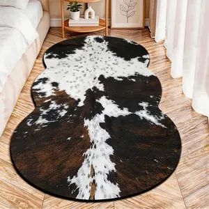 2D Flat velvet irregular rug with brown and white cowhide pattern, machine washable non-slip carpet for bedroom, all seasons & holiday decor, durable & easy to clean.