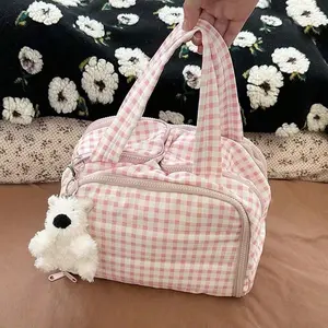 New lightweight travel makeup bag for women, featuring a 4-compartment design, two large mesh pockets on the front, a transparent storage pouch at the bottom, and an elastic drawstring brush pouch