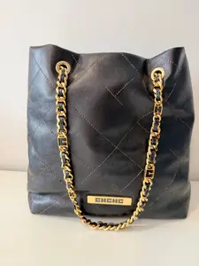 Pre-owned Textured leather-look (grain finish) Bucket Bag Carolina Herrera Pre Loved Black Quilted with Gold Chain Strap