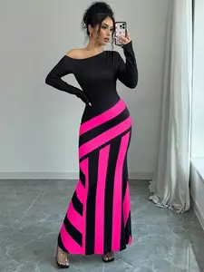 A women's sexy geometric stripe, black pink contrast cross-shoulder long-sleeved fishtail long dress, Bodycon stretch dresses, is suitable for single wear, interior and exterior wear, retro modern style, party fashion style