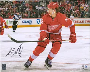 Moritz Seider Detroit Red Wings Autographed 16" x 20" Red Jersey Skating Photograph - Fanatics Authentic Certified