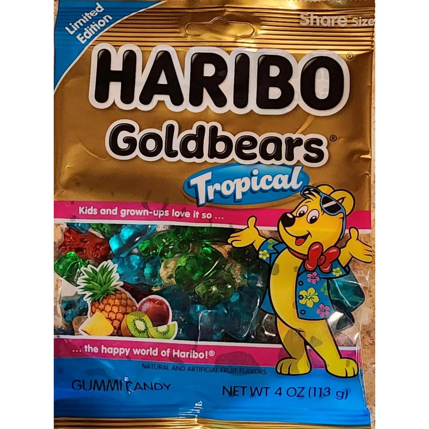 New Limited Edition Haribo Goldbears Gummi Bears Tropical Flavors: Pineapple, Kiwi, Passion Fruit, Paradise Punch. 4oz Share Size