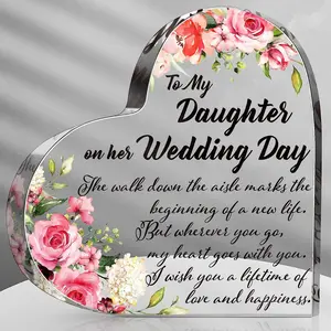 Wedding gifts from parents to their daughter, including keepsakes and special gifts, special gifts for the bride such as an acrylic heart, wedding gifts for the bride and groom, gifts for the bride and groom, bridal gifts, wedding supplies, wedding keepsa