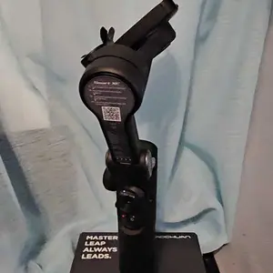 Product Review of Handheld 3 Axis Anti-shake Shooting Stand (1 Count), Rotating Automatic Face Tracking Tripod Stabilizer for Live Video, Phone Accessories, Content Creator Tools from P**🐺