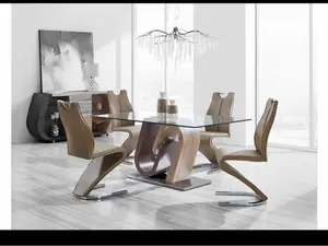 Modern Dining Set. This beautiful set includes 4 modern chairs and a table.