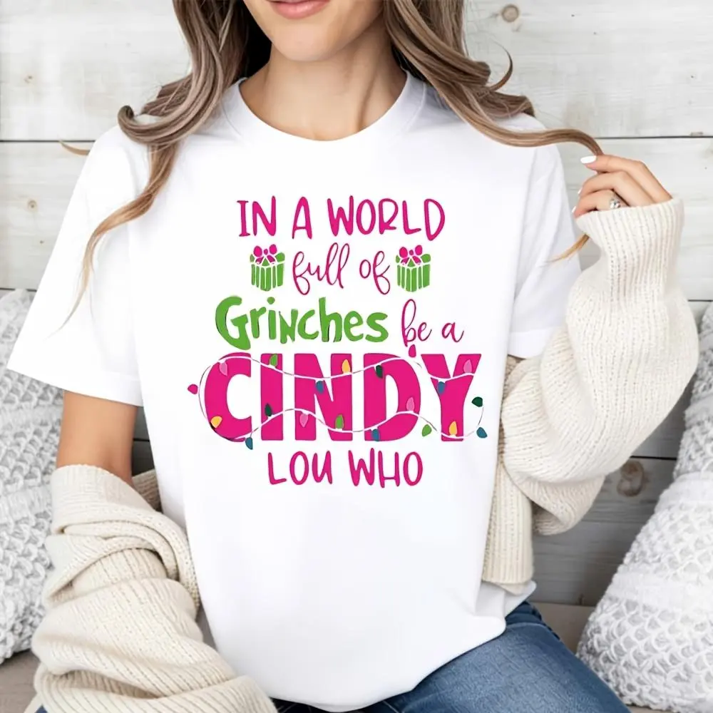 Women's Christmas Graphic T-Shirt - "In A World Full Of Grinches Be A Cindy Lou Who" Print, Festive Xmas Top, Flat Simple Casual Essential Fabric Tee