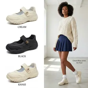 Women’s flat casual white sneakers with a low-cut upper and Velcro closure