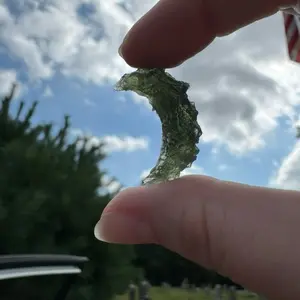 3.99 gram collector quality Moldavite moon shaped specimen