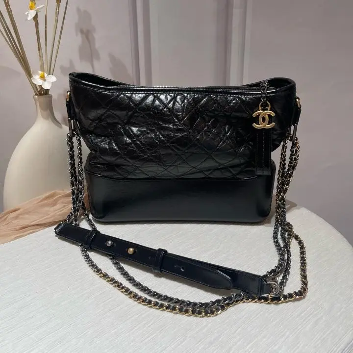 Pre-owned Chanel Medium Gabrielle Hobo Bag in Black Aged Calfskin with Mixed Metal Hardware 24210740