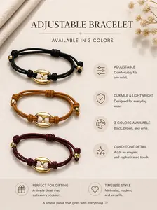 Adjustable minimalist bracelet featuring a gold-tone centerpiece. The soft cord provides a comfortable fit for any wrist, offering a clean, modern style that’s easy to pair with any outfit.