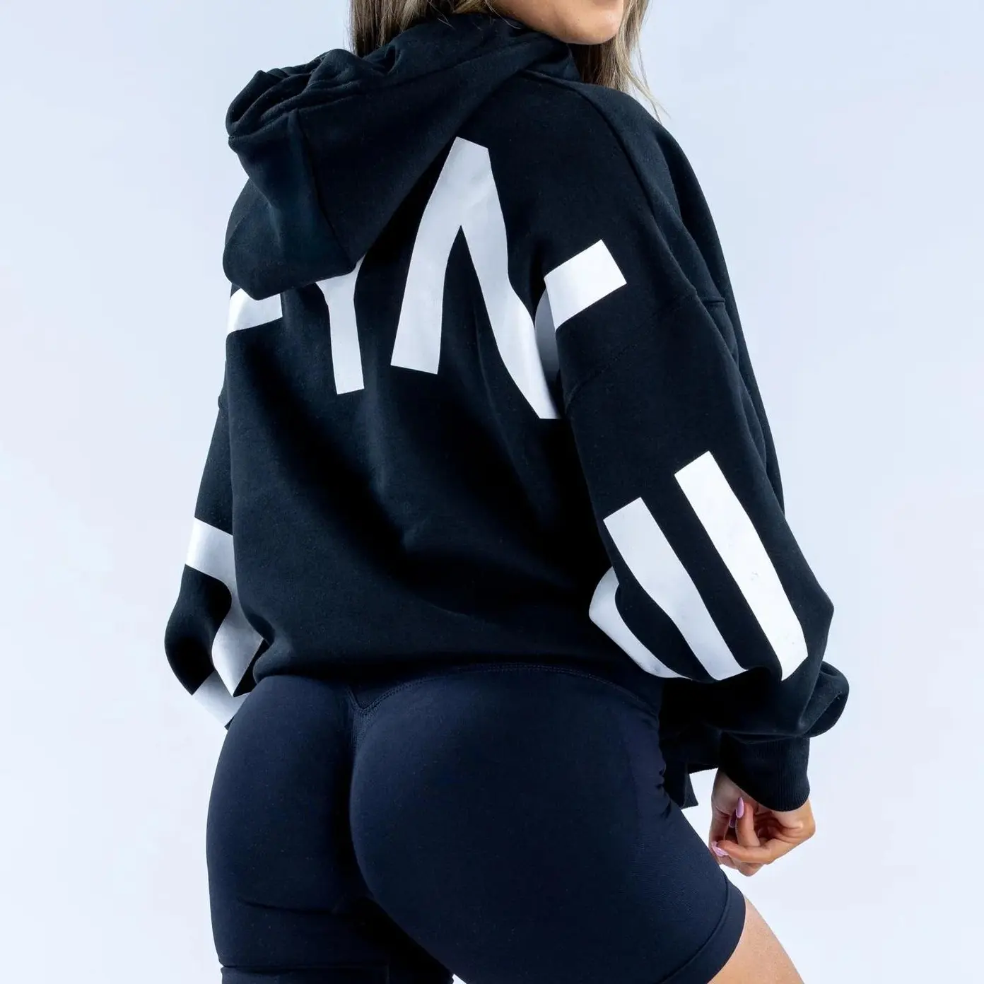 Signature Oversized Hoodie for Women Unisex Boxy Fit with Front Pocket Drawstring Hood and Ribbed Cuff True to Size 65% Cotton 35% Polyester