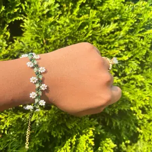 Daisy Bracelet with Gold Accents Adjustable Lobster Claw Clasp Elegant Beaded Design One Size Fits All