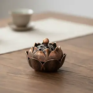 A new Chinese style fingertip lotus stove - red copper incense burner