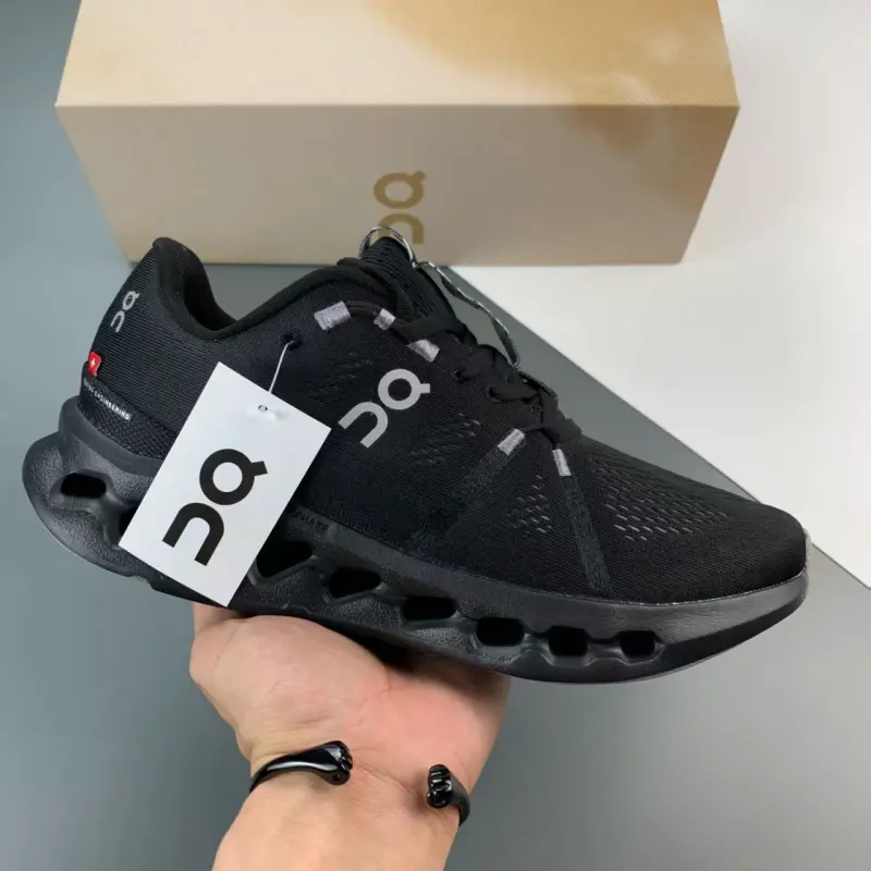 Cushioned running sneakers with full wavy hollow foam midsoles evenly absorbing harsh pavement impact for all-day daily wear, premium stretch breathable knit mesh in solid matte black, grippy rubber outsole