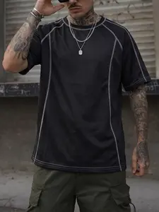 One men’s short-sleeve crewneck top featuring contrasting bright lines; urban casual style. The crewneck short-sleeve is paired with a light gray design with contrasting bright lines—line outlines define the silhouette for a clean look. Soft fabric that’s
