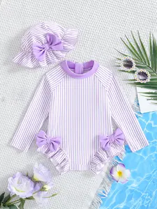 Swimsuit comes with a hat, Toddler swimsuit, girls' one-piece swimsuit, summer pure color striped bowknot decoration long-sleeved sunscreen, ruffle one-piece swimsuit matching hat, suitable for swimming