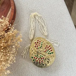 Brass Clutch with Pearl Handle – Dual-Look Statement Piece