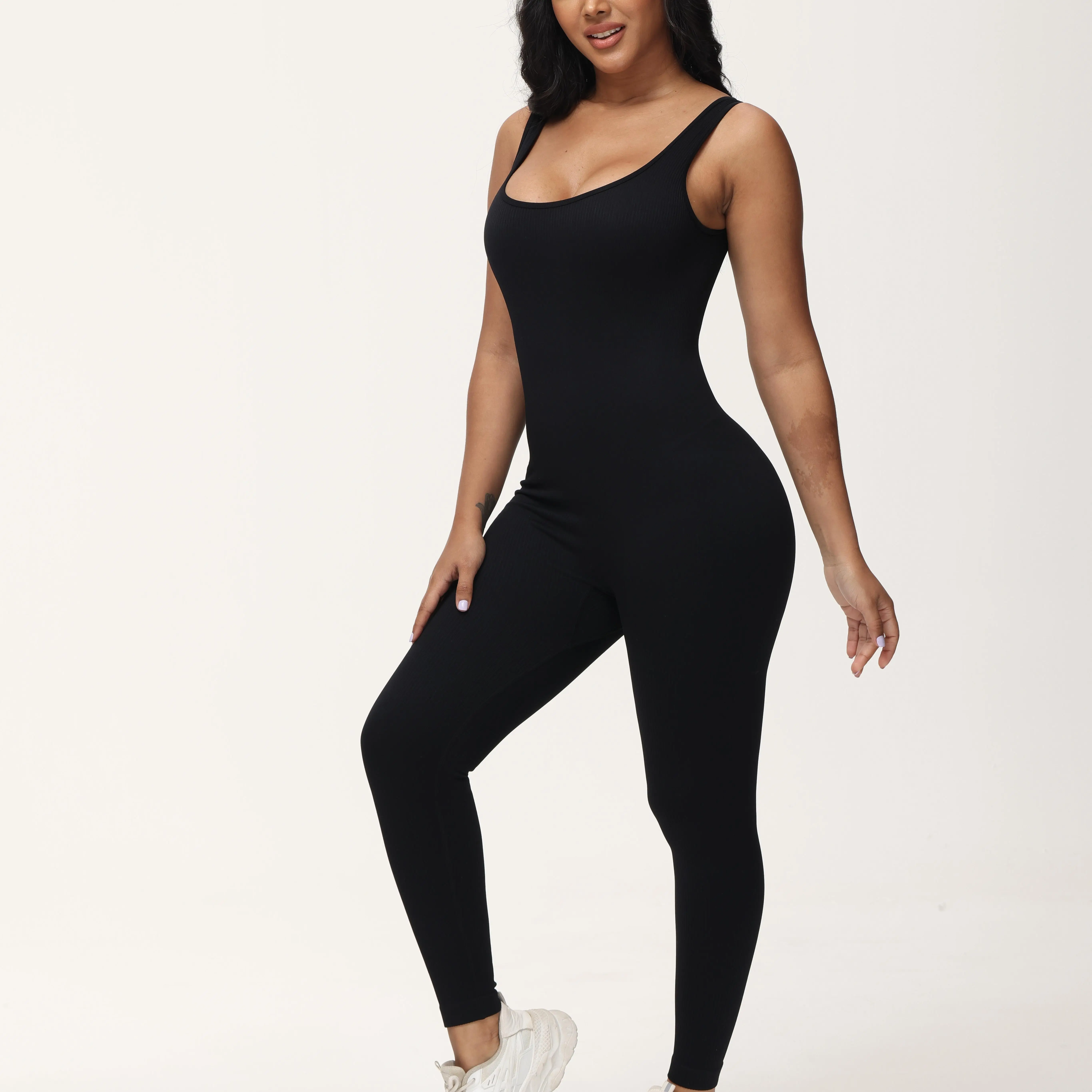 Women's solid sleeveless jumpsuit with a square neck and backless design, featuring body sculpting tummy control in ribbed knit for a slim fit, ideal