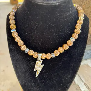 Handcrafted Rhinestone Beaded Necklace with Gold Tone Rhinestone Beads and Rhinestone Bolt