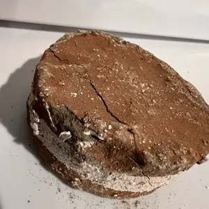 Sobri-mamut . Made with terron humo, white caolin and clay. Made in mexico