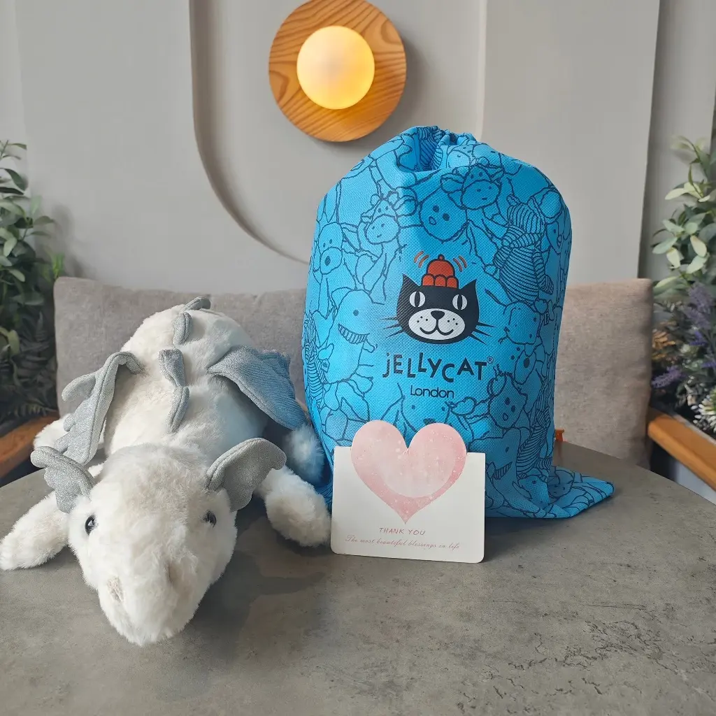 Jellycat White Flying Dragon (50cm) – An ultra-soft winged plush toy, an ideal cuddly companion and a perfect gift for friends.