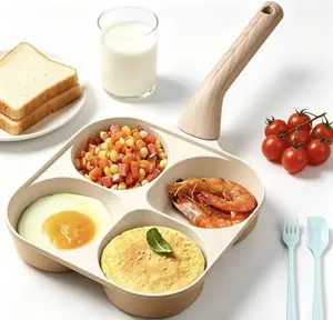 Multifunctional non-stick frying pan. This 4-compartment pan with a handle is made of natural stone and is ideal for making pancakes, burgers, breakfast dishes, and quick family meals. Beige non-stick frying pan. Non-stick wok