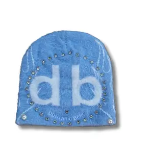 DONTARIO BERC FUZZY CAP with Embellished Letter Design & Blue Color for Stylish Wear