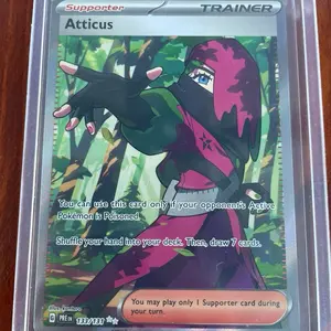 Atticus #133 Pokemon Prismatic Evolutions Trainer Card - Supporter with Special Poisoned Condition Effect