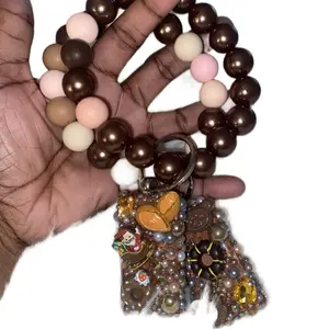 Chocolate Drop Embellished Stylish Keychain with Festive Donuts and Golden Beads for Festive Season