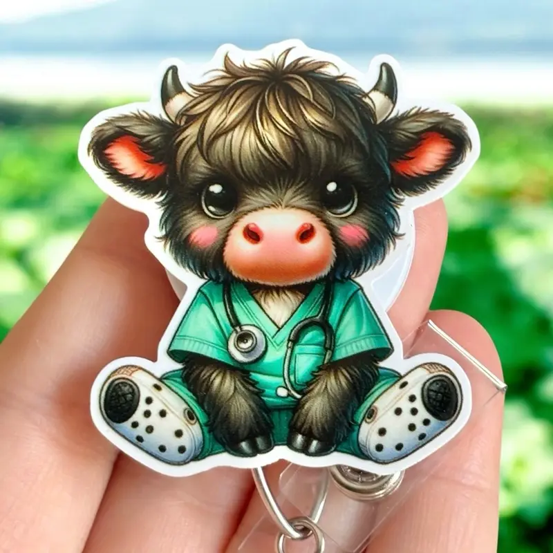 Glitter My Badge highland baby cow in scrubs nurse badge reel for nurse and hospital workers. Badge clip Badge pull - Retractable swivel clip with a 360 rotation. Great gift for coworker.