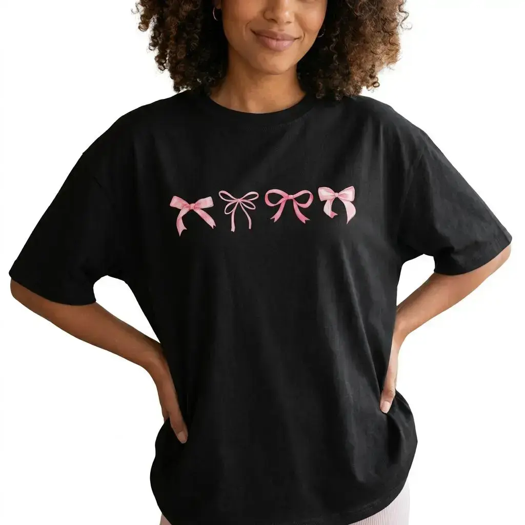 Women's Plus-Size Coquette Pink Bow Graphic Tee - Feminine, Casual, Comfortable Balletcore Shirt with Denim-Inspired Streetwear Vibes