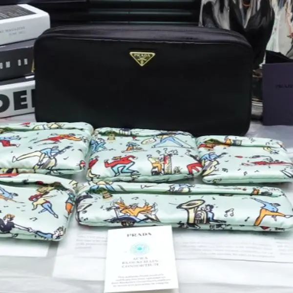 Pre-owned PRADA Satin Clutches & Wristlets Black Clutch T10365266