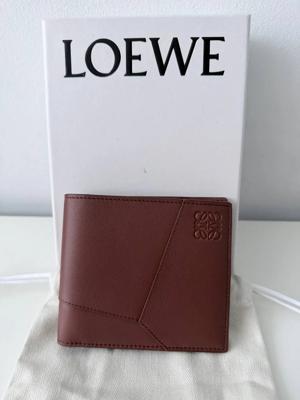 Pre-owned Leather Clutches & Wristlets Billetera Plegable Loewe Puzzle en Piel Marrón