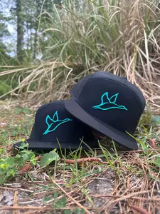 Seafoam Icon 7 Panel Black Hat with Decorative Logo, Adjustable Fit, Versatile Style for Everyday Wear