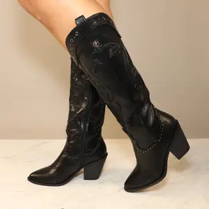 Lady cowboy boot point toe with a block heel mid-calf length embellished western design with a side zipper