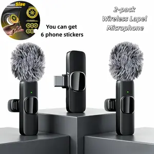 Two-pack wireless clip-on mic in black. Works with iPhone, iPad & Android! Plug and play—super easy. Smart noise cancellation for clean, crisp audio. Perfect for vlogs, live streams, interviews