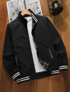 Men’s jacket featuring a white ribbed stand collar, plaid lining, and zippered pocket; urban casual style with contrasting ribbed trim paired with a plaid interior; smooth, structured fabric suitable for men’s shopping, exploring shops, and outings—classi