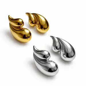 TEIKET Liquid Flame Statement Earrings – Gold & Silver