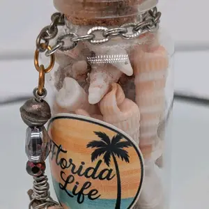 Handcrafted Florida Before Us genuine authentic one of a knd shell filled trinket bottle ornament featuring a wire wrapped shark tooth by ToothRaiders