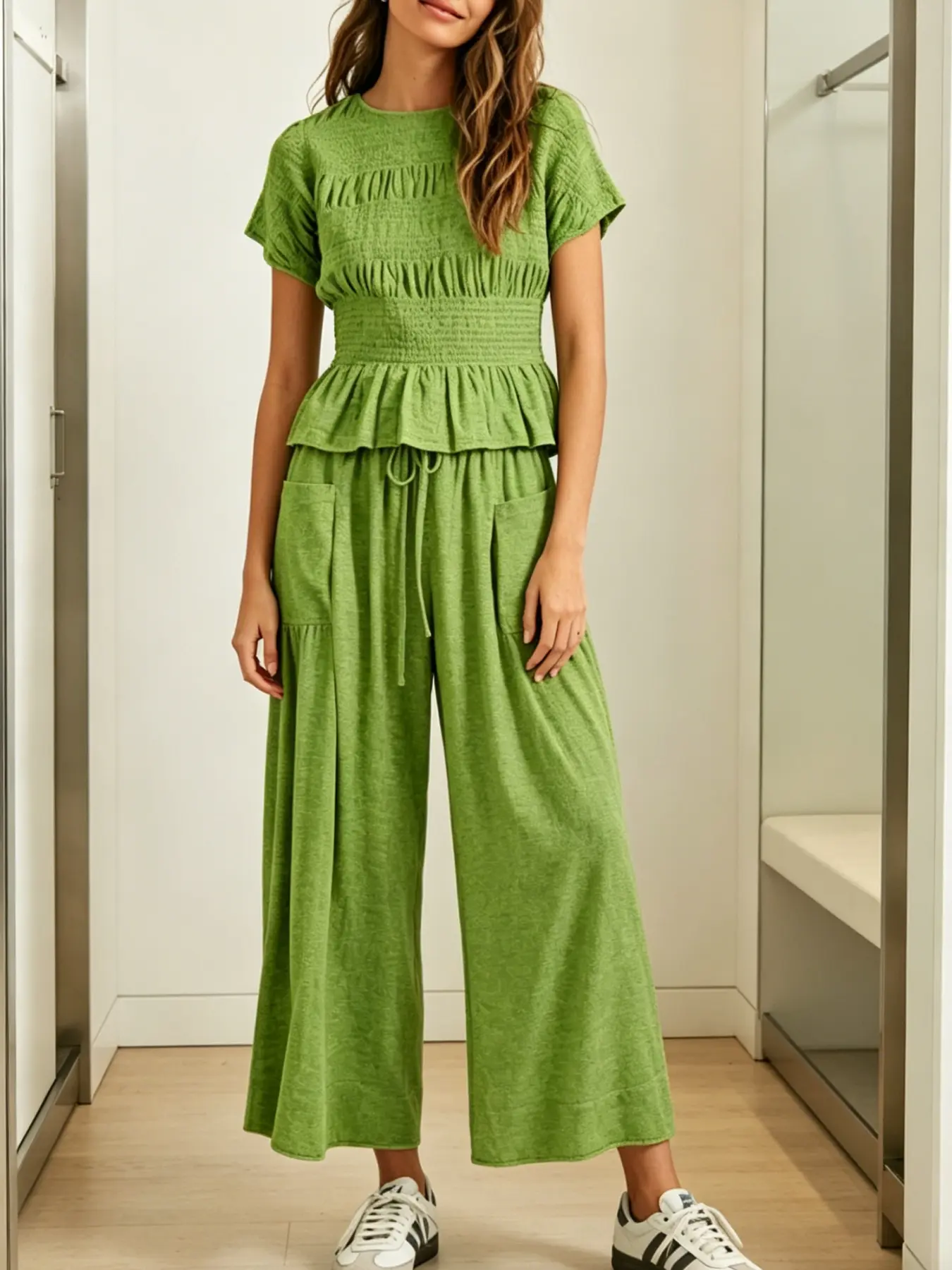 Women's Fashion Casual High-End Textured Cotton Ruffled Short Sleeve Two-Piece Set, with waist-cinching ruffles and a flowing wide-leg pant design, perfect for summer, vacations, indoor, and outdoor wear