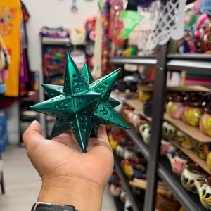 Christmas mexicano decoracion Mexican tin star ornament, often called a “estrella de latón” or “farol estrella.