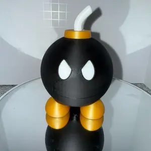 Ticking Time Canister with Fuse - Black and Yellow Design Featuring a Unique Face