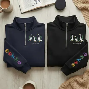 Like All Fire Goose Quater Zip – The Hunger Games Embroidered Crewneck